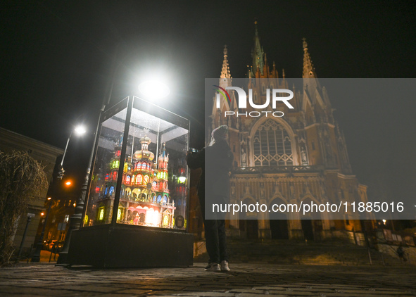 KRAKOW, POLAND - DECEMBER 20:   
A Nativity Scene displayed in Podgorze Market Square in front of St. Joseph's Church, on December 20, 2024...