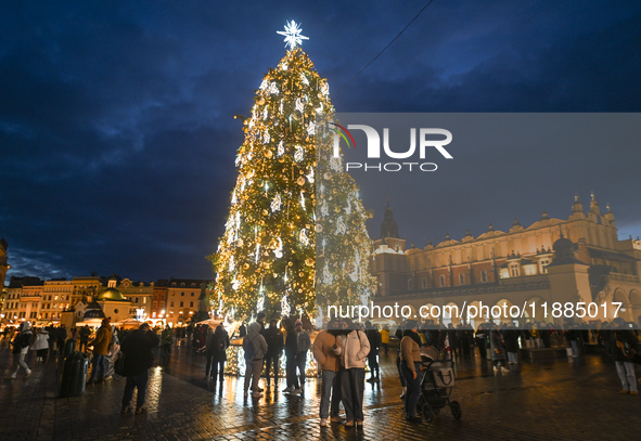 KRAKOW, POLAND - DECEMBER 20:   
An illuminated Christmas tree stands in Krakow's UNESCO-listed Main Square, on December 20, 2024 in Krakow,...