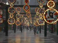 Pedestrians face strong storms in the center of Sao Paulo, Brazil, on December 20, 2024, this Friday afternoon. (