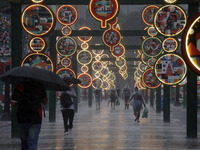 Pedestrians face strong storms in the center of Sao Paulo, Brazil, on December 20, 2024, this Friday afternoon. (