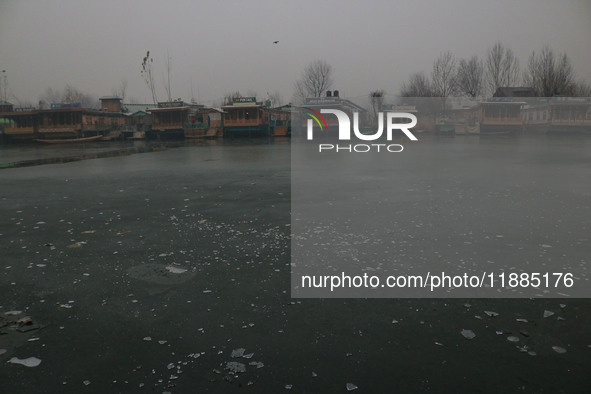 A frozen portion of Dal Lake is seen in Srinagar, Jammu and Kashmir, on December 21, 2024. The 40-day harsh winter period, locally referred...