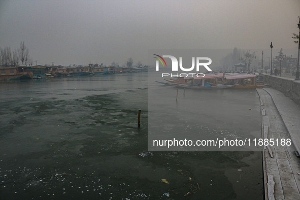 A frozen portion of Dal Lake is seen in Srinagar, Jammu and Kashmir, on December 21, 2024. The 40-day harsh winter period, locally referred...