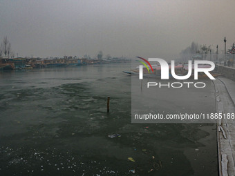 A frozen portion of Dal Lake is seen in Srinagar, Jammu and Kashmir, on December 21, 2024. The 40-day harsh winter period, locally referred...