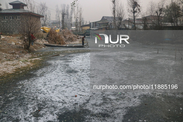 A frozen portion of Dal Lake is seen in Srinagar, Jammu and Kashmir, on December 21, 2024. The 40-day harsh winter period, locally referred...