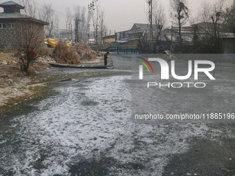 A frozen portion of Dal Lake is seen in Srinagar, Jammu and Kashmir, on December 21, 2024. The 40-day harsh winter period, locally referred...