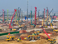 Pile driving operation takes place at the construction site of the Nanjing North Station Hub Project in Nanjing, China, on December 21, 2024...