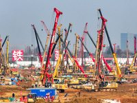 Pile driving operation takes place at the construction site of the Nanjing North Station Hub Project in Nanjing, China, on December 21, 2024...