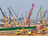 Pile driving operation takes place at the construction site of the Nanjing North Station Hub Project in Nanjing, China, on December 21, 2024...