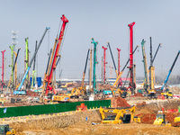 Pile driving operation takes place at the construction site of the Nanjing North Station Hub Project in Nanjing, China, on December 21, 2024...