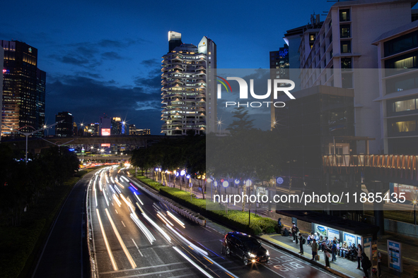 Evening traffic occurs in the central business district of Jakarta, Indonesia, on December 21, 2024. The government plans to raise the Value...