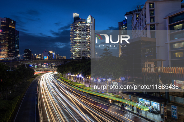 Evening traffic occurs in the central business district of Jakarta, Indonesia, on December 21, 2024. The government plans to raise the Value...