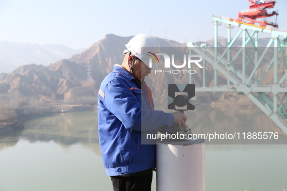 An aerial photo shows the construction of the Jianzha Yellow River Bridge, a key project of the Sichuan-Qinghai Railway in Jianzha County, Q...