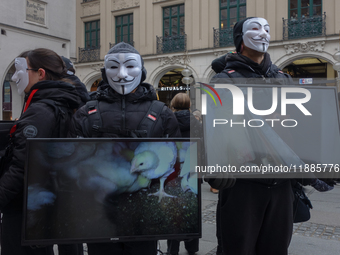 The group 'Anonymous for the Voiceless', an animal rights organization specializing in street activism, holds a 'Cubes of Truth' protest act...