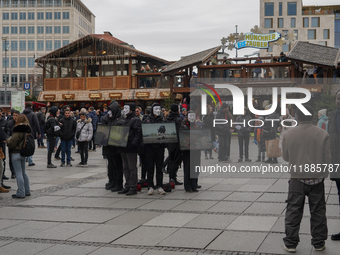 The group 'Anonymous for the Voiceless', an animal rights organization specializing in street activism, holds a 'Cubes of Truth' protest act...