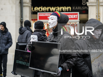 The group 'Anonymous for the Voiceless', an animal rights organization specializing in street activism, holds a 'Cubes of Truth' protest act...