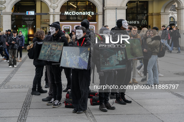 The group 'Anonymous for the Voiceless', an animal rights organization specializing in street activism, holds a 'Cubes of Truth' protest act...