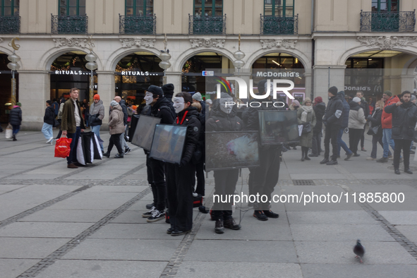 The group 'Anonymous for the Voiceless', an animal rights organization specializing in street activism, holds a 'Cubes of Truth' protest act...