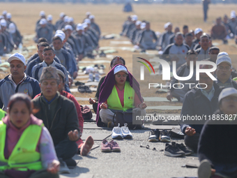 People meditate during a celebratory event organized on the occasion of the first World Meditation Day in Kathmandu, Nepal, on December 21,...