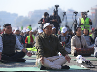 Nepal's former Home Minister Narayan Kaji Shrestha (center) attends a meditation event organized on the occasion of the first World Meditati...