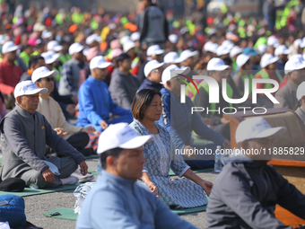 Deputy House Speaker Indira Rana Magar meditates during an event organized to mark World Meditation Day in Kathmandu, Nepal, on December 21,...