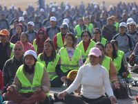 People meditate during a celebratory event organized on the occasion of the first World Meditation Day in Kathmandu, Nepal, on December 21,...