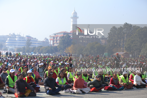 People meditate during a celebratory event organized on the occasion of the first World Meditation Day in Kathmandu, Nepal, on December 21,...