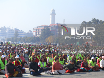 People meditate during a celebratory event organized on the occasion of the first World Meditation Day in Kathmandu, Nepal, on December 21,...