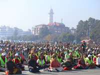 People meditate during a celebratory event organized on the occasion of the first World Meditation Day in Kathmandu, Nepal, on December 21,...