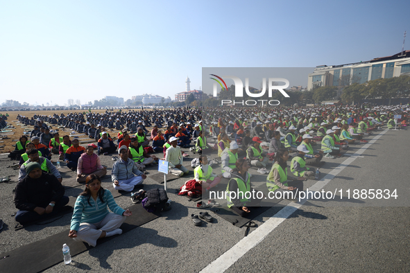 People meditate during a celebratory event organized on the occasion of the first World Meditation Day in Kathmandu, Nepal, on December 21,...