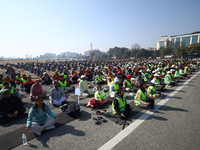 People meditate during a celebratory event organized on the occasion of the first World Meditation Day in Kathmandu, Nepal, on December 21,...