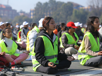 People meditate during a celebratory event organized on the occasion of the first World Meditation Day in Kathmandu, Nepal, on December 21,...