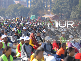 People meditate during a celebratory event organized on the occasion of the first World Meditation Day in Kathmandu, Nepal, on December 21,...