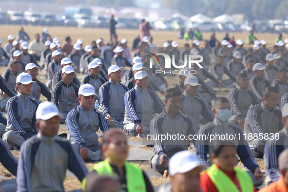 People meditate during a celebratory event organized on the occasion of the first World Meditation Day in Kathmandu, Nepal, on December 21,...