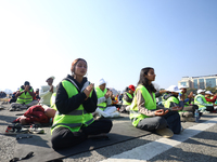 People meditate during a celebratory event organized on the occasion of the first World Meditation Day in Kathmandu, Nepal, on December 21,...