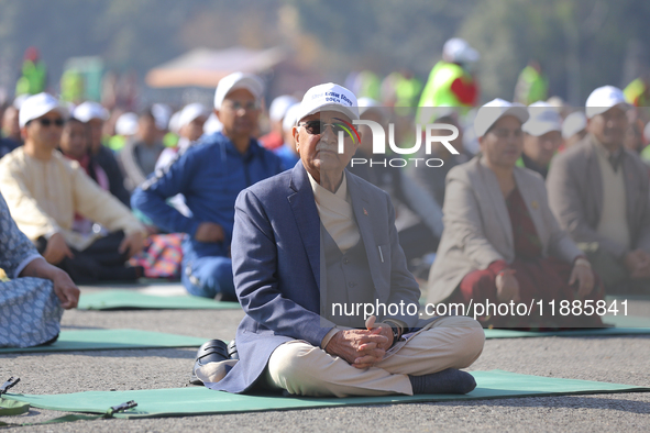 Nepali Prime Minister KP Sharma Oli (Center) attends an event organized on the first World Meditation Day in Kathmandu, Nepal, on December 2...