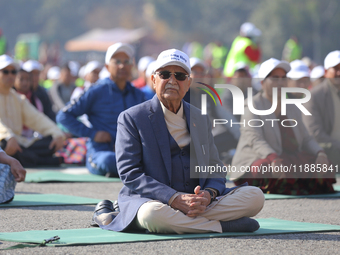 Nepali Prime Minister KP Sharma Oli (Center) attends an event organized on the first World Meditation Day in Kathmandu, Nepal, on December 2...