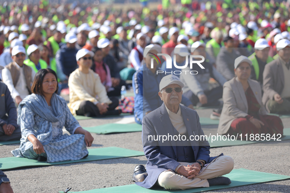 Nepali Prime Minister KP Sharma Oli (Center) attends an event organized on the first World Meditation Day in Kathmandu, Nepal, on December 2...