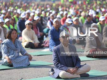 Nepali Prime Minister KP Sharma Oli (Center) attends an event organized on the first World Meditation Day in Kathmandu, Nepal, on December 2...