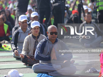 People meditate during a celebratory event organized on the occasion of the first World Meditation Day in Kathmandu, Nepal, on December 21,...