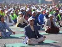 Nepali Prime Minister KP Sharma Oli (center) meditates during an event organized on the first World Meditation Day in Kathmandu, Nepal, on D...