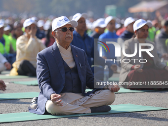 Nepali Prime Minister KP Sharma Oli (center) meditates during an event organized on the first World Meditation Day in Kathmandu, Nepal, on D...