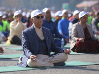 Nepali Prime Minister KP Sharma Oli (center) meditates during an event organized on the first World Meditation Day in Kathmandu, Nepal, on D...