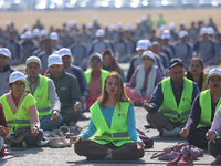 People meditate during a celebratory event organized on the occasion of the first World Meditation Day in Kathmandu, Nepal, on December 21,...