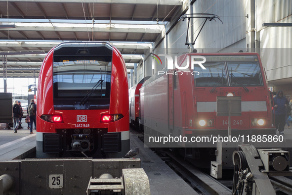 Two regional trains are at Munich Central Station in Bavaria, Germany, on December 21, 2024. 