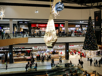 Shoppers make last minute shopping in Bonarka shopping mall ahead of Christmas Day on Saturday December 21, 2024. (