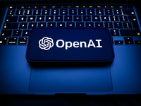 A laptop keyboard and OpenAI logo displayed on a smartphone are seen in this illustration photo taken in Krakow, Poland on December 21, 2024...