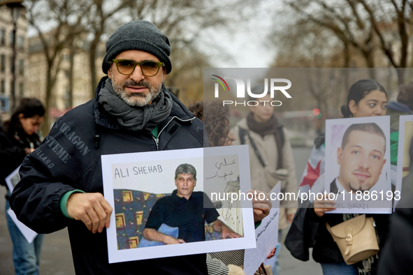 Members of the Syrian community gathered in solidarity with the victims of Bashar al-Assad's prisons in Syria at Place de la Bastille in Par...