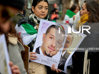 Members of the Syrian community gathered in solidarity with the victims of Bashar al-Assad's prisons in Syria at Place de la Bastille in Par...