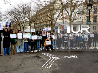 Members of the Syrian community gathered in solidarity with the victims of Bashar al-Assad's prisons in Syria at Place de la Bastille in Par...