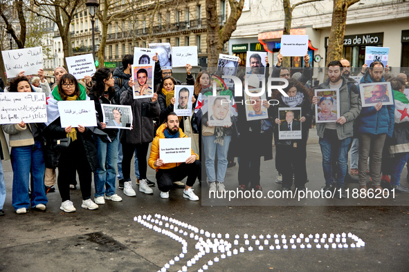 Members of the Syrian community gathered in solidarity with the victims of Bashar al-Assad's prisons in Syria at Place de la Bastille in Par...